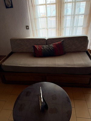 Two sofa beds and table set