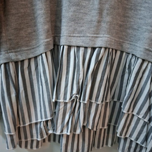 Long-sleeve blouse with ruffle hem gray new