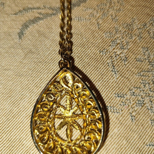 Necklace used with long chain and gold-plated teardrop pendant