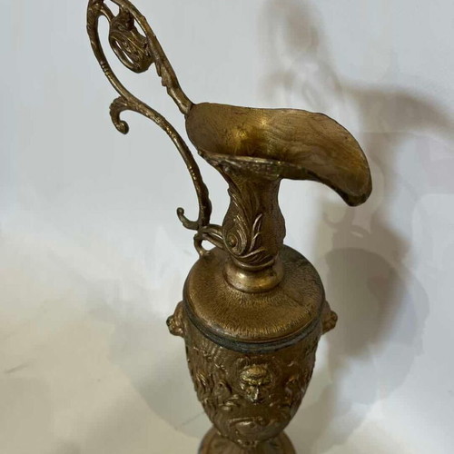 Vintage bronze decorative pitcher with baroque reliefs