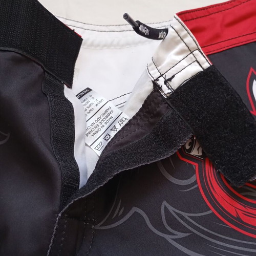 Venum MMA Extreme Fight shorts used, size XL, black and red