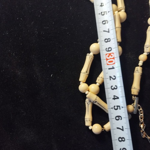 Beige necklace used