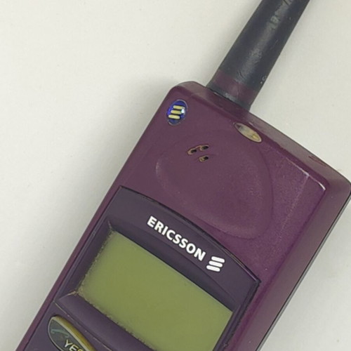 Ericsson A1018s mobile phone like new, plum color, original charger