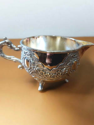 Silver-plated vintage milk jug like new with floral embossed decoration