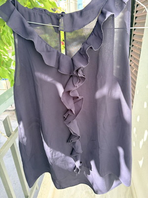 Sleeveless blouse blue, like new, size M