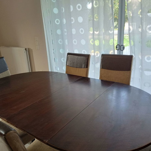 Round extendable dining set used with 6 alkadara chairs