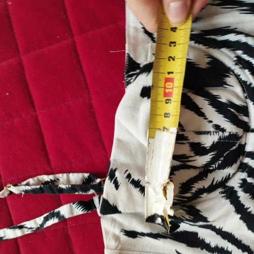 Corset-style tiger print strap top with zipper, comfortable