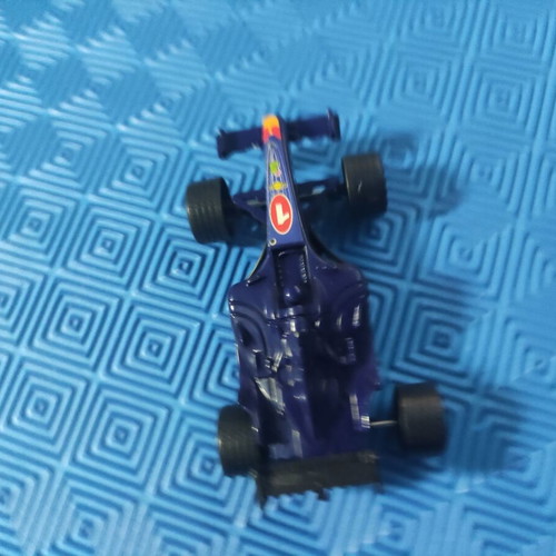 Set of 4 small toys like new, toy cars and motorcycle