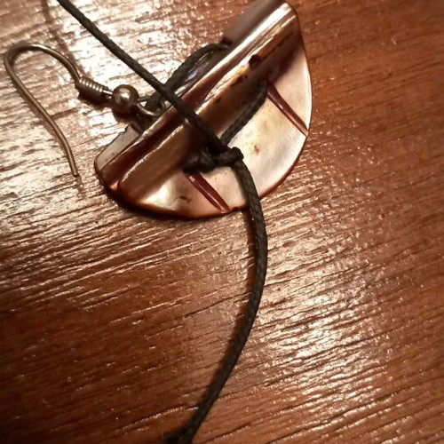 Earrings like new made of natural shell material