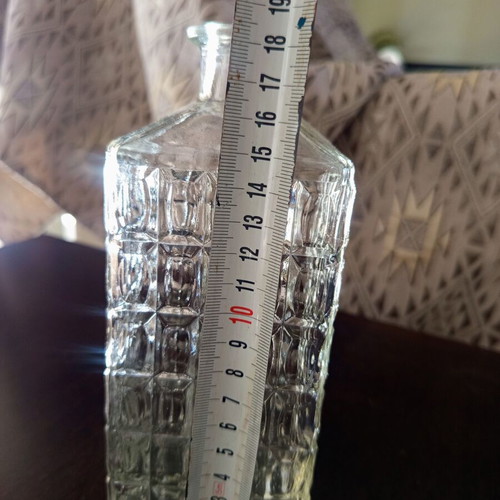 Square glass bottle vintage with embossed design without stopper