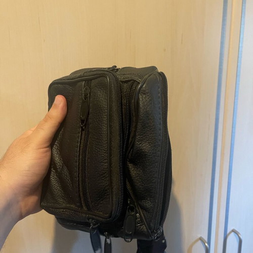 Black waist bag like new with minor zipper defect