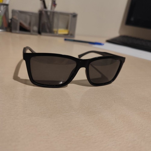 Invu men's sunglasses used, black with visible scratch on lens