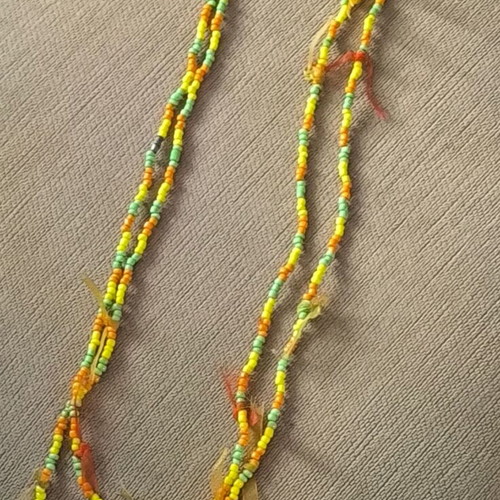 Long necklace like new with yellow, orange and green beads