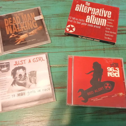 CD pack used, 3 rock compilations and soundtrack, original