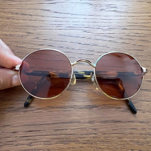 Vintage round sunglasses used with metal frame