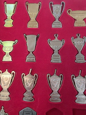 Olympiacos collectible miniature trophies and championship cups, 37 pieces, new