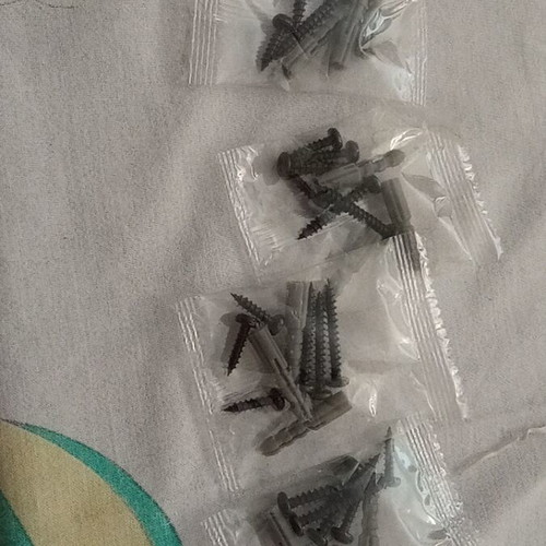 Screws and wall plugs new, sold together