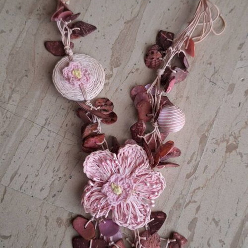 Handmade long necklace with crocheted pink flower and shells