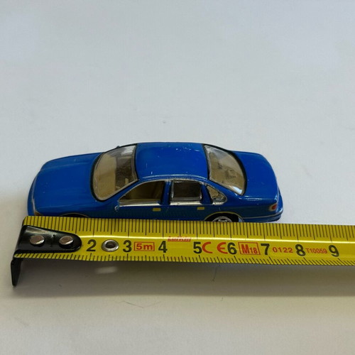 Johnny Lightning 1999 Chevy Caprice 1995 toy car used, very good condition