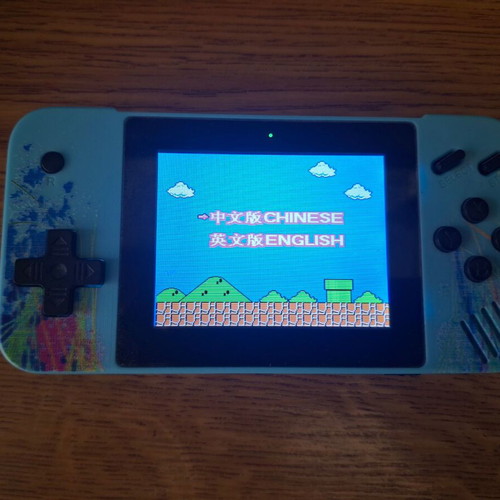 Game Box G3 handheld console used, 800-in-1, blue splatter design