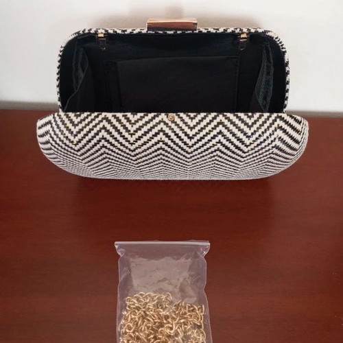 Clutch bag with hard frame, new, black and gold chevron pattern