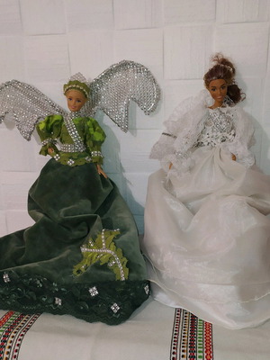 Barbie dolls used, two with handmade dresses