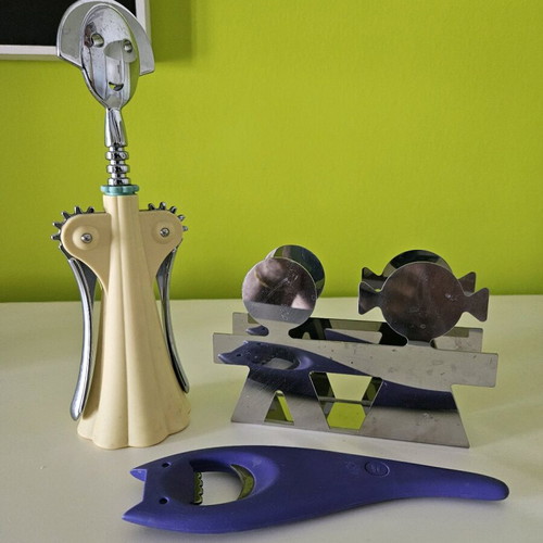 Alessi set with beer opener, wine opener and napkin holder like new