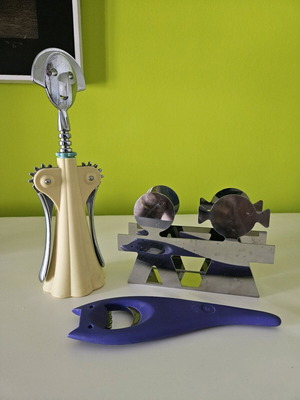 Alessi set with beer opener, wine opener and napkin holder like new
