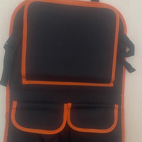 Car seat back organizer like new with 3 pockets and foldable tray