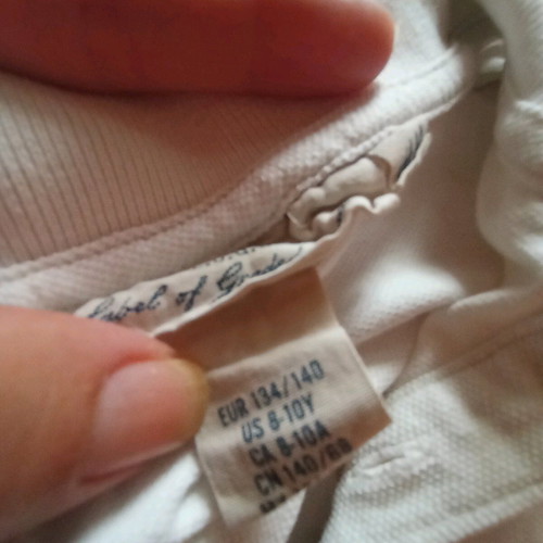 Boys' polo style shirt white, like new, size 134-140
