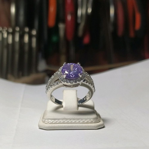 Silver (925) ring new with purple stone and smaller stones