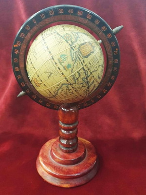 Old globe used with wooden base