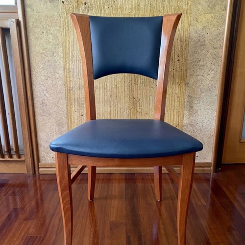 Extendable dining table from rosewood with six chairs like new