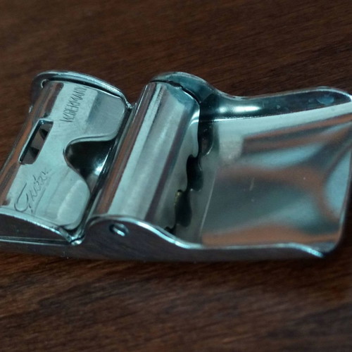 Collectible Gutos steel belt buckle used, shiny silver, men's