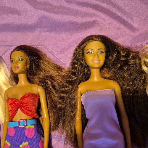 Barbie dolls used, various prices