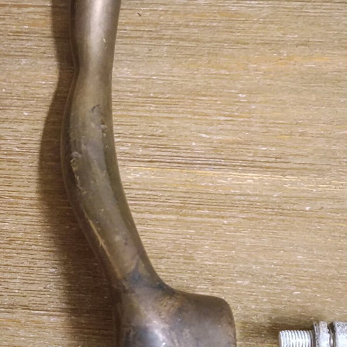 Pair of vintage brass door handles 1950 with natural patina used