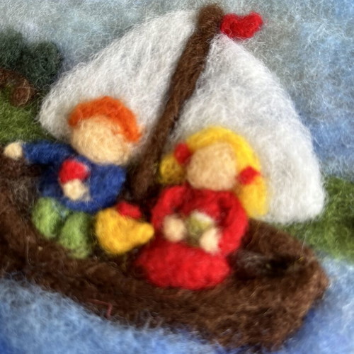Handmade wool felt wall art with sailing boat and children