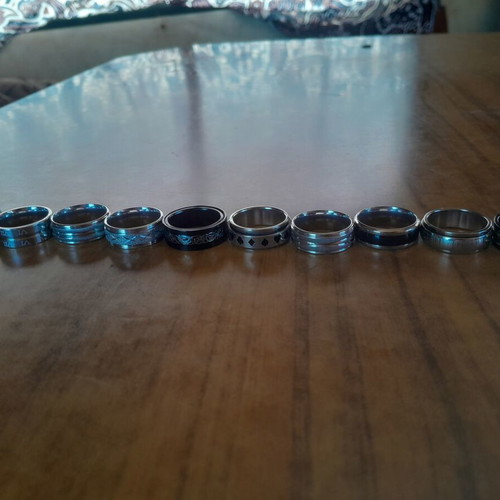 Rings medium size, black and silver, like new, set of 10