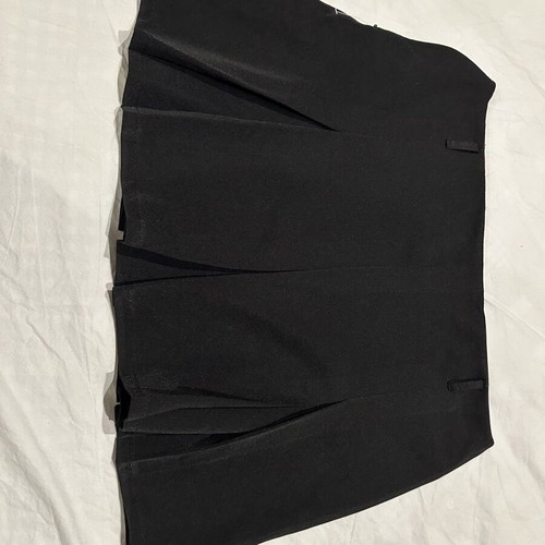 Black pleated mini skirt with hidden zipper