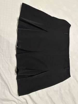 Black pleated mini skirt with hidden zipper
