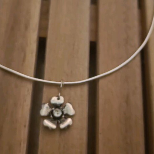 Silver-colored handmade necklace with flower like new