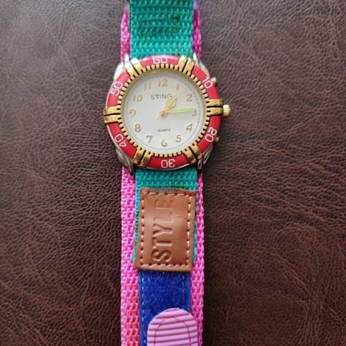 Vintage wristwatch new with metal dial and luminous hands