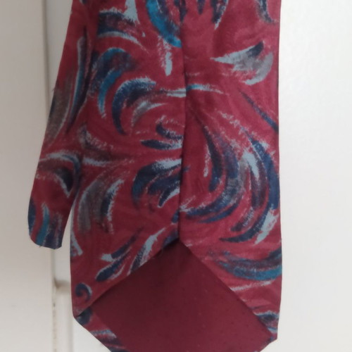 Canda tie used in red and blue shades
