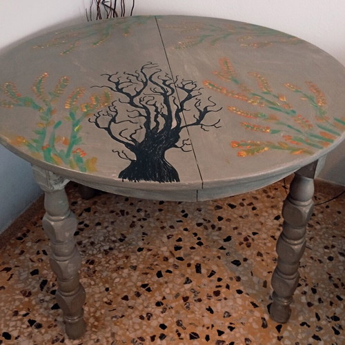 Round table with painted design, chalk paint