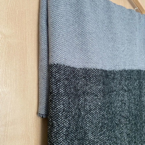 Scarf like new with gray and beige color combination and fringes