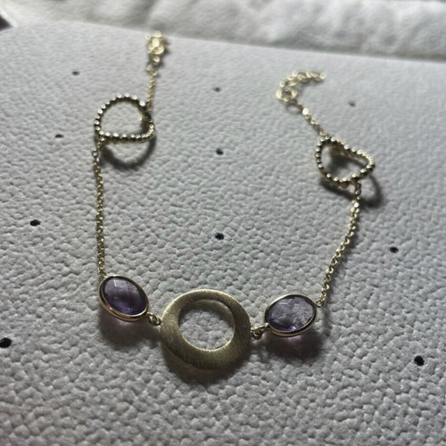Gold bracelet new with amethyst and lilac stones