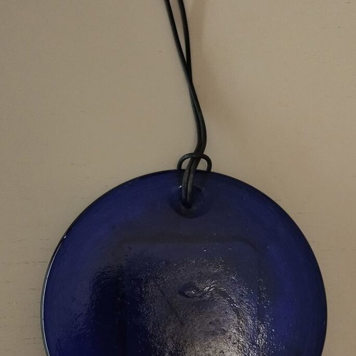 Blue round icon with Christ like new