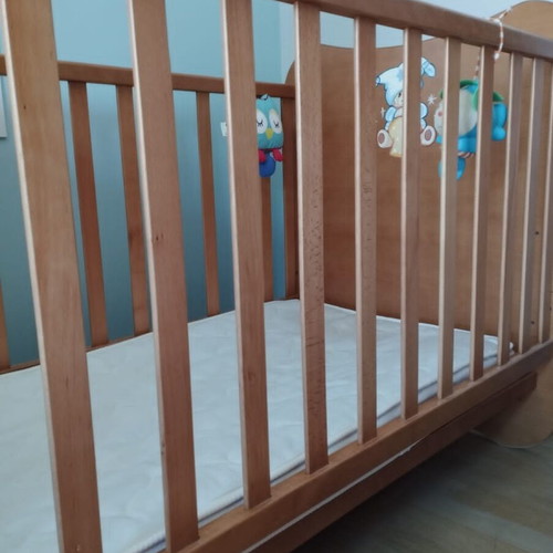 Baby cot used with mattress and adjustable height