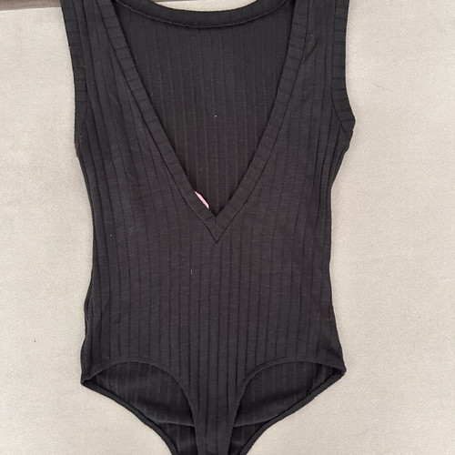 Pink Woman black ribbed body with V neckline size S like new