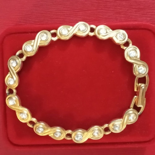 Swarovski infinity crystal bracelet faux vintage used, wrist size 18cm